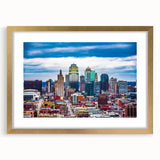 Extra large abstract art print of Kansas City skyline in muted gold and gray tones on a framed canvas.