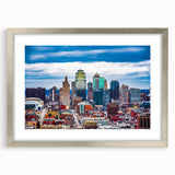 Textured abstract art print of Kansas City skyline in muted gray tones on framed silver mat, ideal for bedroom art.