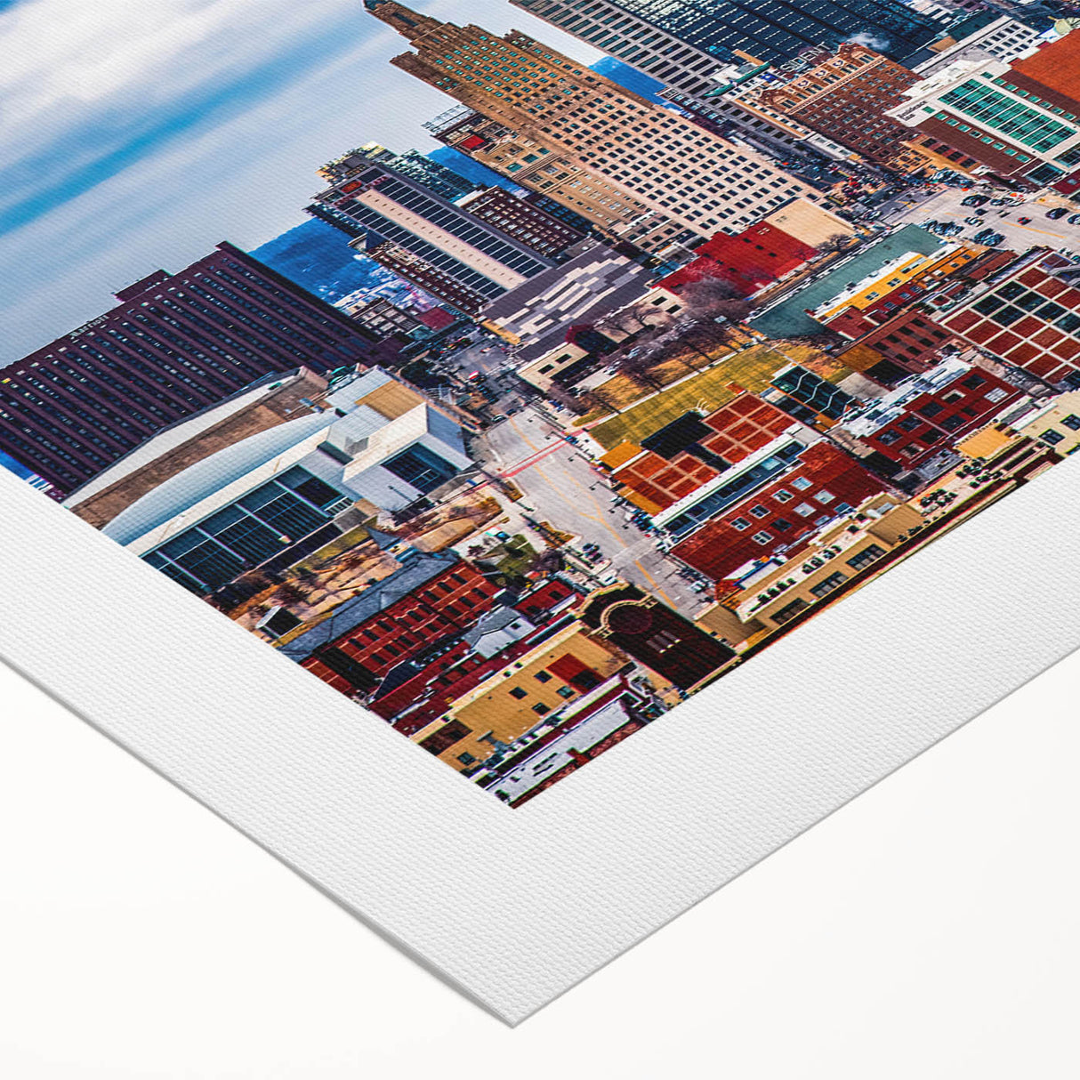 Art deco poster of Kansas City skyline in muted gold and blue tones on rolled canvas, suitable for dining room decor.