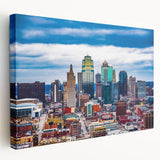 Kansas City skyline depicted in muted blue and gray tones on a large stretched canvas, suitable for kitchen wall art.