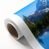 Art deco-style poster of Glacier National Park on rolled canvas, featuring muted earth tones, ideal for nursery wall art.