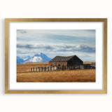 Extra large wall art of abstract Montana scenery in textured gold frame, ideal for living room ambiance.