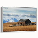 Vintage poster art of a scenic Montana landscape on a framed canvas, featuring a palette of vibrant greens and blues.