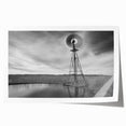 Rolled print of Nebraska scenery with floral elements in soft earth tones, ideal for dining room wall art.