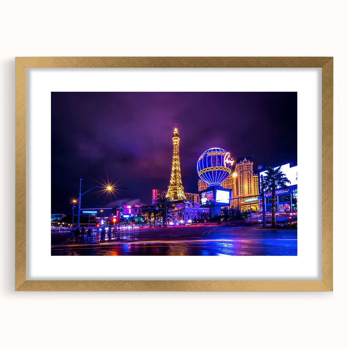 Extra large abstract art print featuring textured depiction of Las Vegas skyline in gold frame, ideal for living room decor.