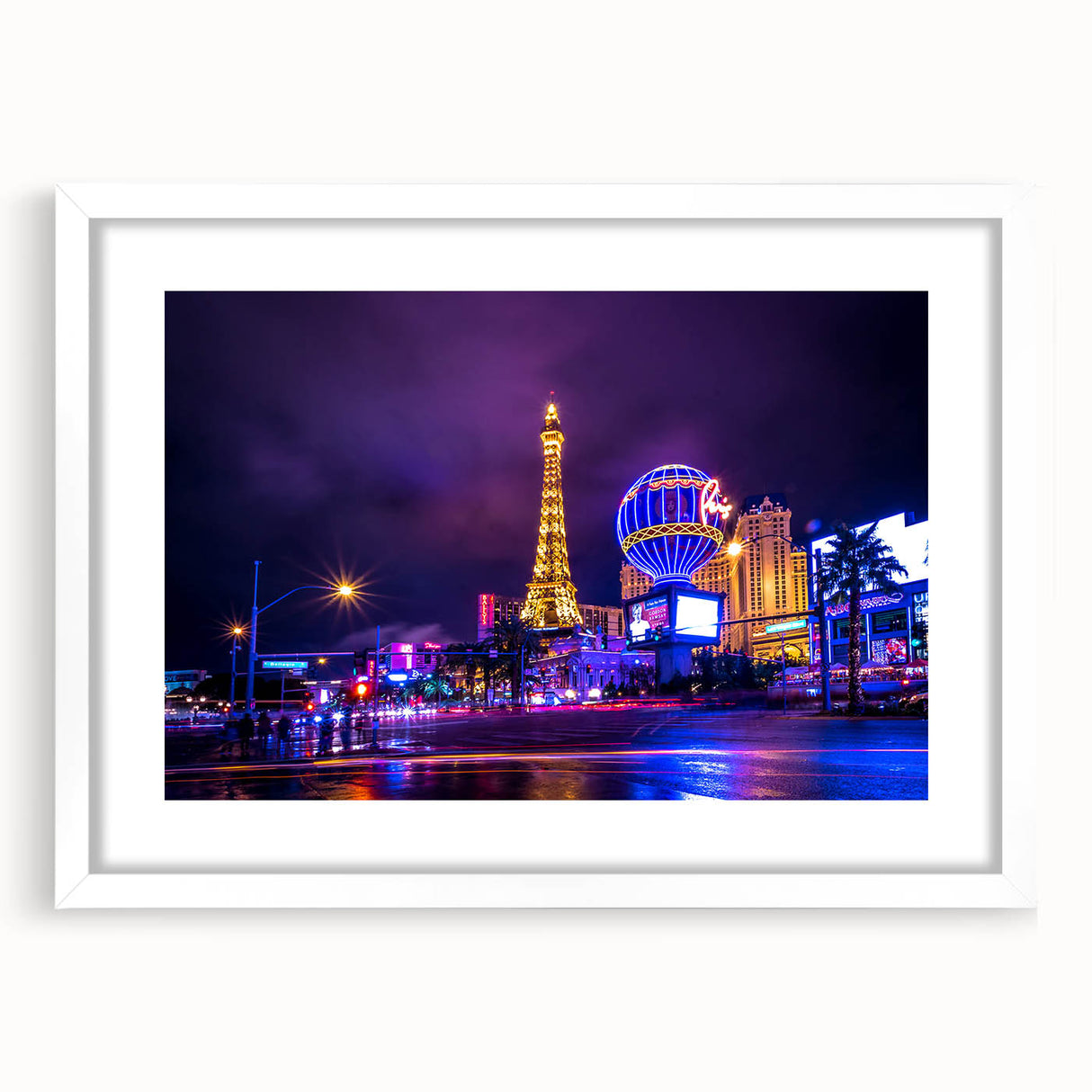Abstract art print of Las Vegas skyline with vivid neon colors on a framed white mat, ideal for dining room decor.