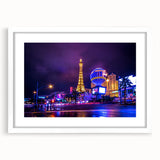 Abstract art print of Las Vegas skyline with vivid neon colors on a framed white mat, ideal for dining room decor.