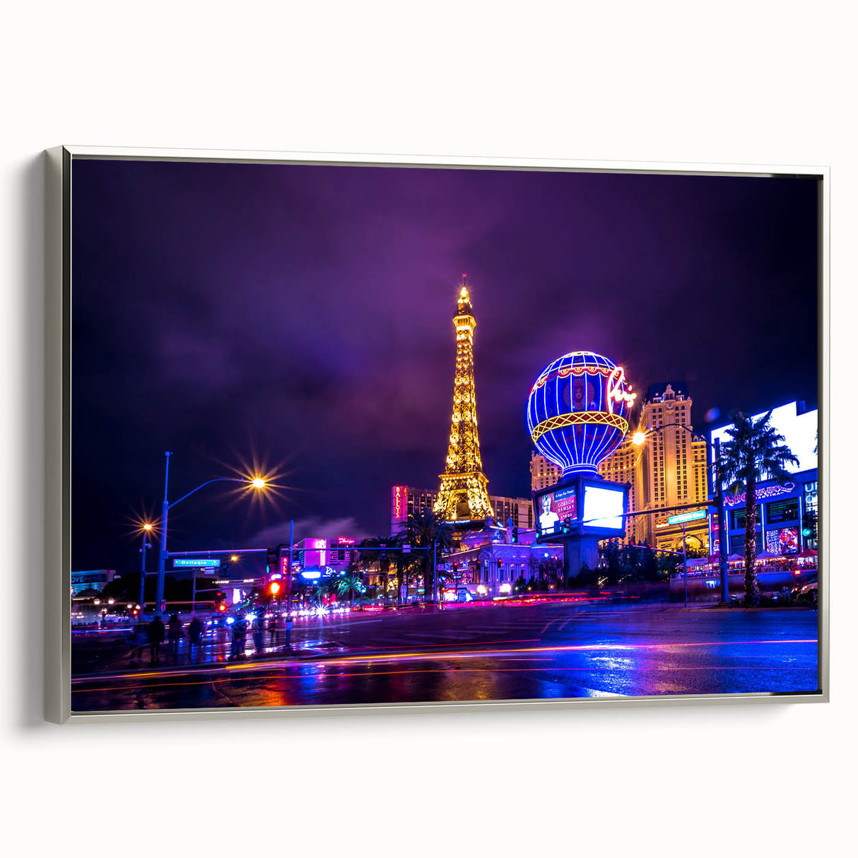 Framed canvas landscape art painting depicting a colorful Las Vegas scene in vintage poster style.