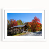 Abstract art print of New Hampshire scenery in muted earth tones on a framed white mat.