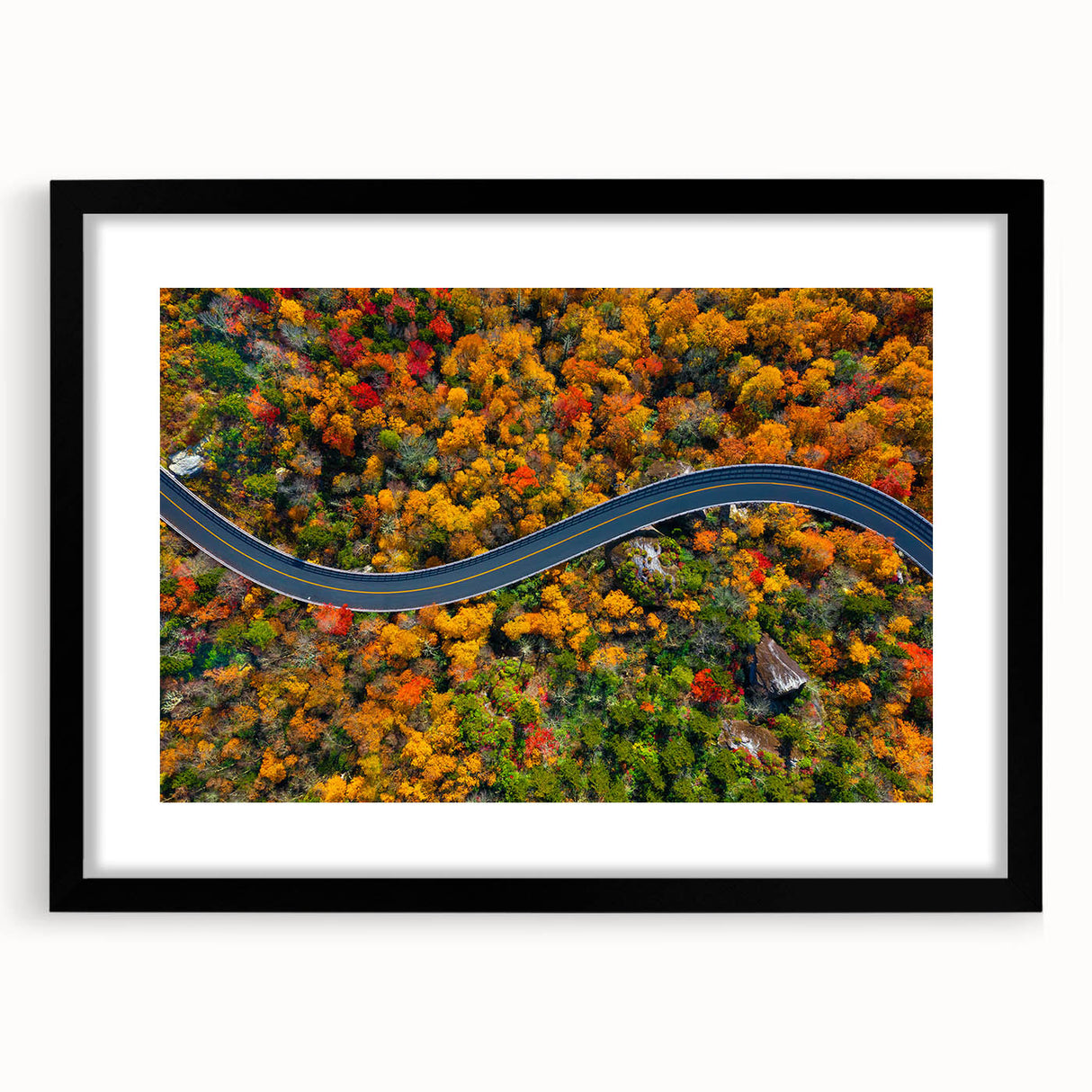 Abstract art print of Blue Ridge scenery in vibrant blue and green tones on a large framed canvas.