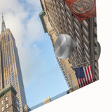 Large abstract depiction of NYC's Empire State Building in muted gray tones on acrylic glass, ideal for dining room art.