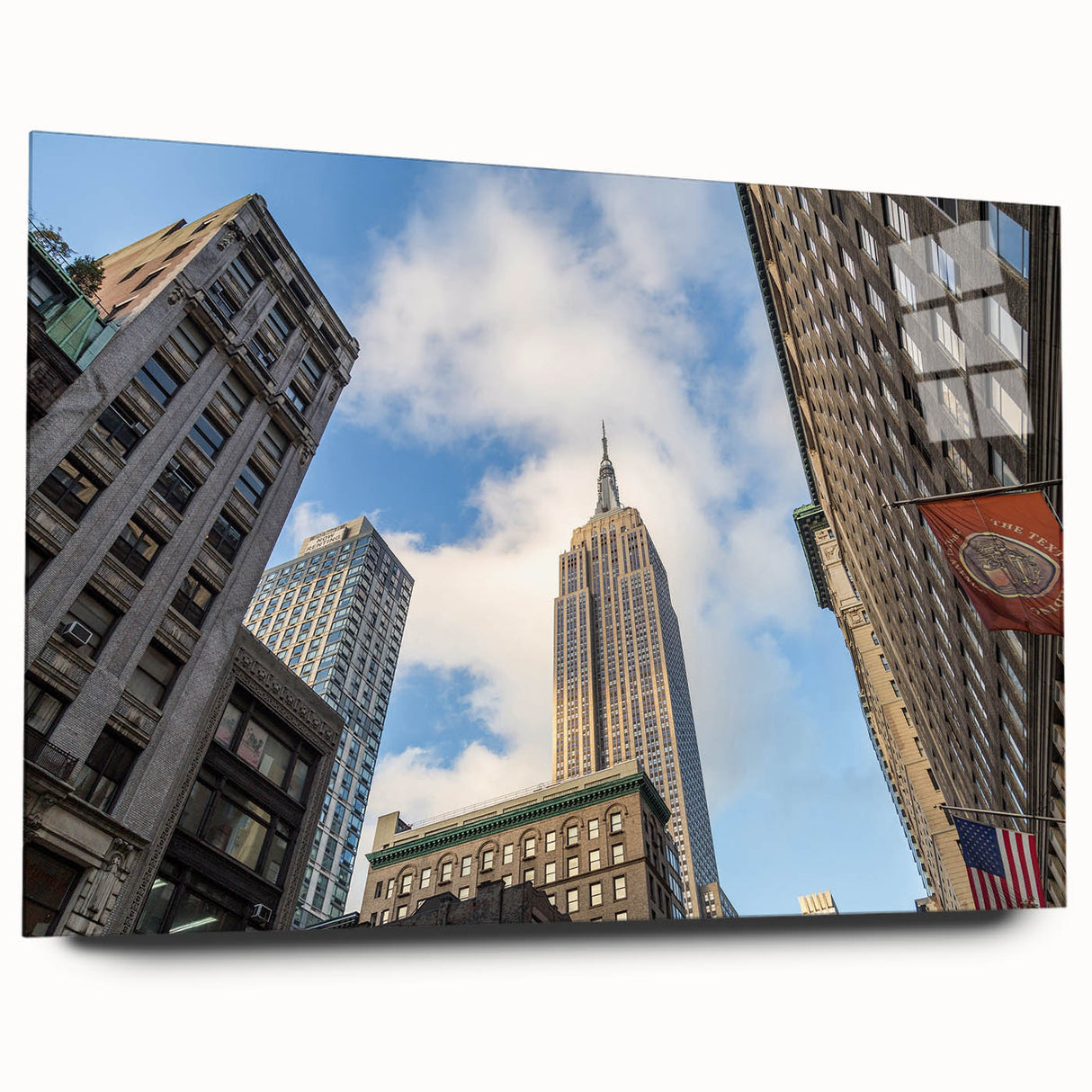 Acrylic print of a large abstract depiction of the NYC skyline in cool blue and gray tones.