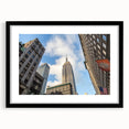 Abstract art print of NYC with vibrant colors and textured design on a large framed canvas, ideal for living room decor.