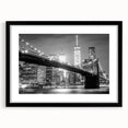 Extra large textured abstract print of Manhattan Bridge in colorful art style on a black framed canvas.