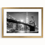 Extra large abstract art print of the Manhattan Bridge in muted gray tones on a gold-framed canvas.