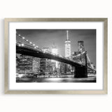 Textured art print of the Manhattan Bridge in muted gray tones on a framed silver mat, ideal for bedroom art.