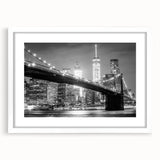 Abstract art print of the Manhattan Bridge in muted gray and blue tones on a framed poster, suitable for dining room decor.