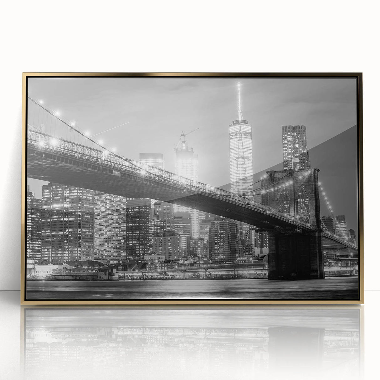 Acrylic print of the Manhattan Bridge in muted gray tones, framed in gold, perfect for modern art wall decor.