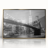 Acrylic print of the Manhattan Bridge in muted gray tones, framed in gold, perfect for modern art wall decor.
