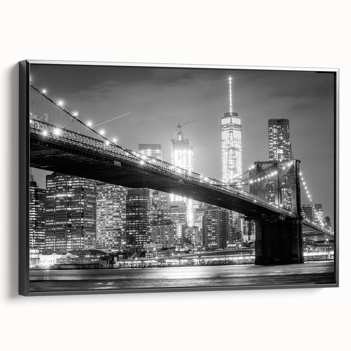 Black and white wall art featuring the Manhattan Bridge, in a vintage poster style on framed canvas.
