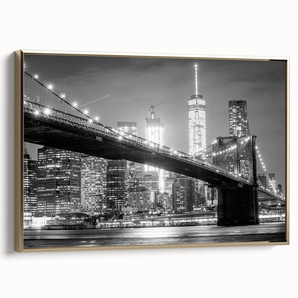Framed canvas wall art featuring a vintage-style Manhattan Bridge landscape in black and gold tones, ideal for bedroom decor.
