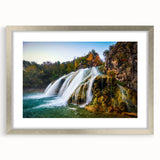 Textured abstract art print of a serene Oklahoma landscape in muted earth tones, framed in silver, ideal for bedroom decor.