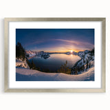 Textured art print of Crater Lake in Oregon, featuring abstract blue and green tones on a silver-framed mat.