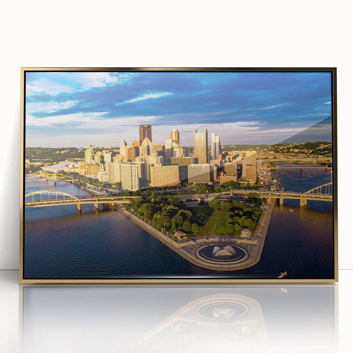 Mid-century modernist art of Pittsburgh skyline in gold and black hues on framed acrylic, suitable for modern art wall decor.