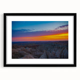 Abstract art print of South Dakota Badlands in black frame with mat, featuring earthy tones, ideal for dining room decor.