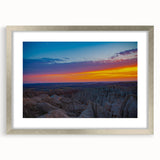 Extra large abstract art print of South Dakota Badlands in textured style, featuring earth tones, framed in silver.