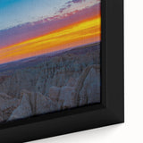 Black and white framed canvas of Badlands landscape, ideal for bedroom wall decor.