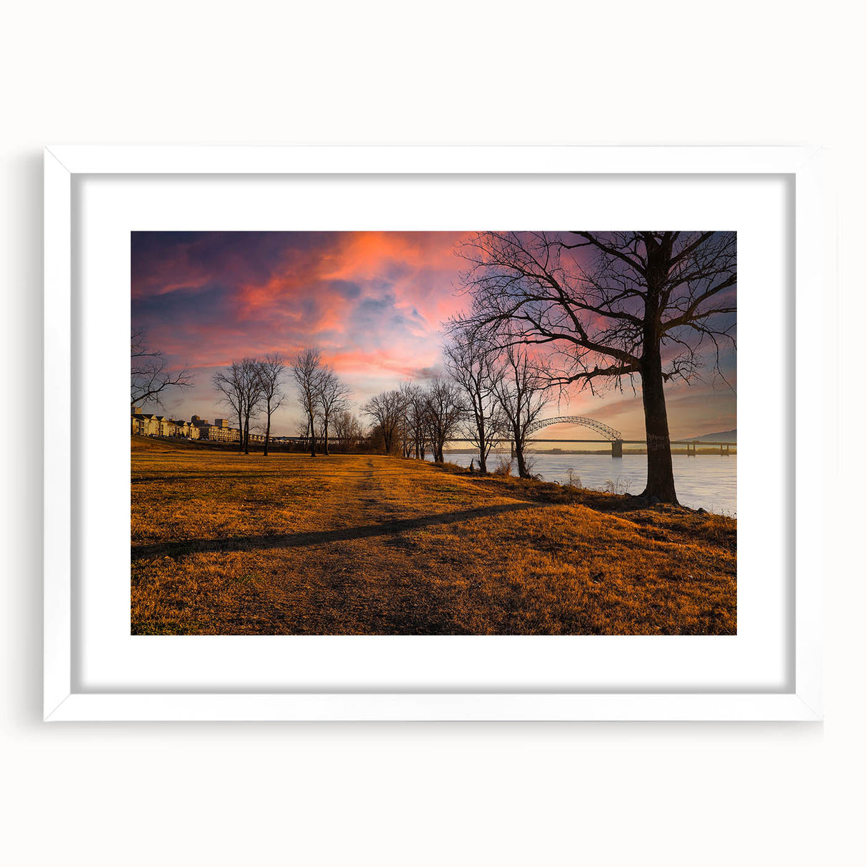 Abstract art print of Memphis skyline in muted blue and gray tones on a framed white mat, ideal for dining room decor.