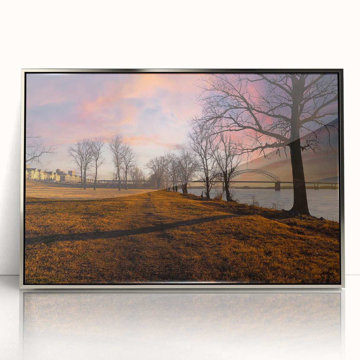 Mid-century modernist art depicting the Memphis skyline in pastel shades on a silver-framed acrylic print.