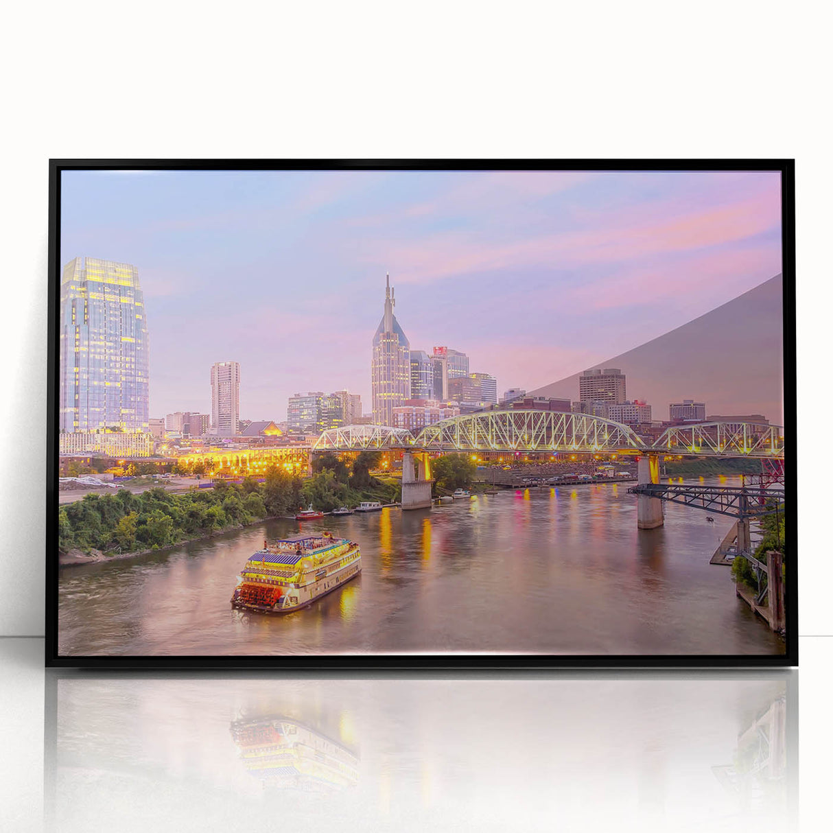 Large abstract wall art of Nashville skyline in muted gray, acrylic print in black frame.