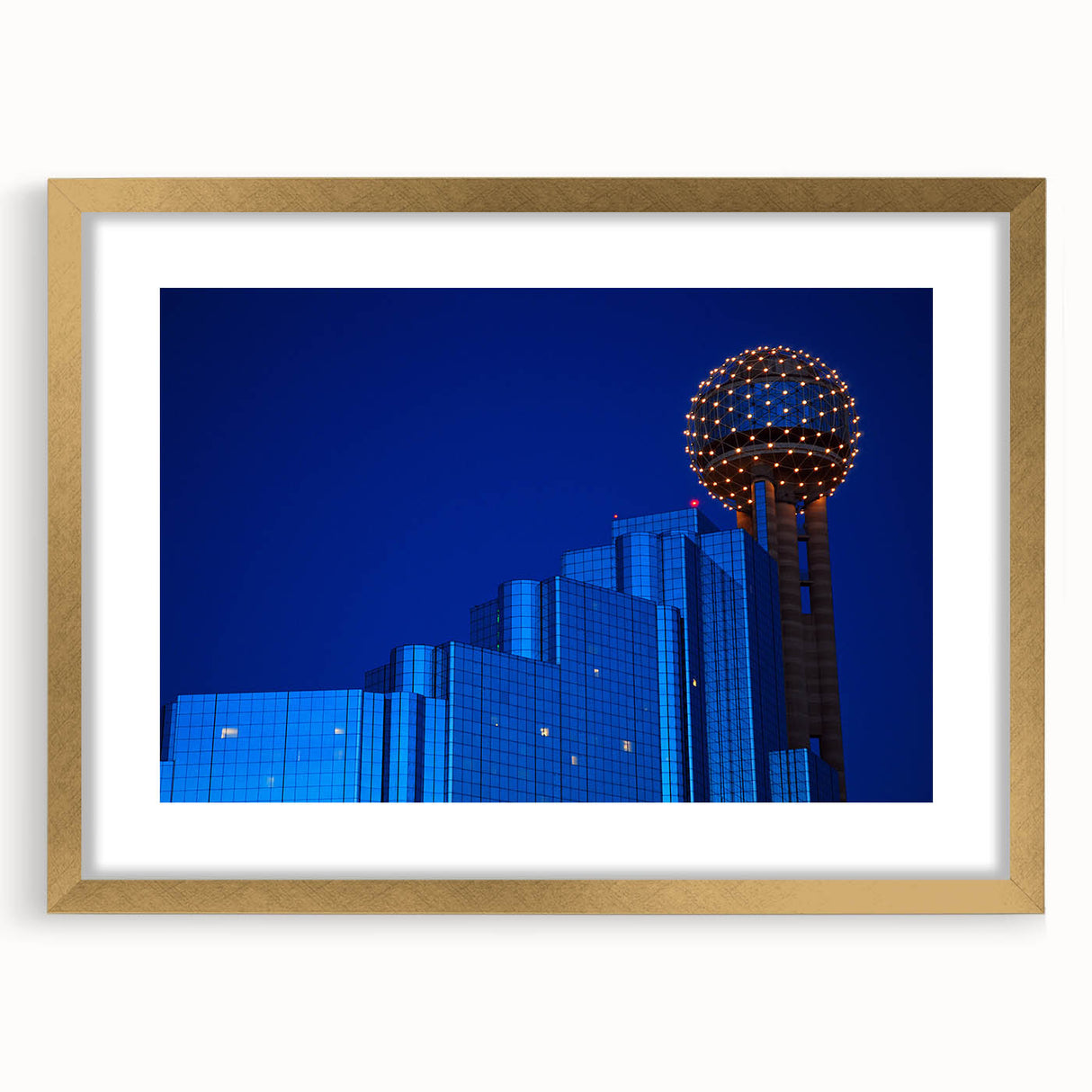 Extra large abstract art print of Dallas skyline in muted gold and blue tones on a textured canvas.