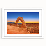 Abstract art print of Arches National Park in muted earth tones on a framed white mat.