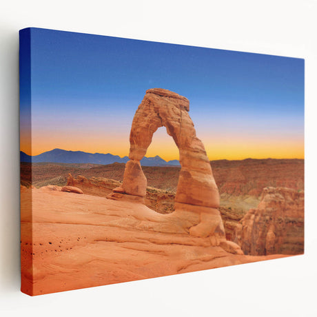 Large canvas print of Arches National Park, featuring natural red rock formations under a clear blue sky.