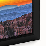 Close-up of extra large framed canvas featuring a textured depiction of Bryce Canyon in black with colorful accents.