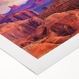 Art deco poster depicting Zion National Park on a rolled canvas, featuring earthy red and green tones.