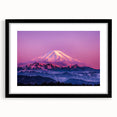 Extra large abstract art print of Mount Rainier in vibrant colors on a black framed canvas, ideal for living room decor.
