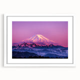Abstract art print of Mount Rainier in muted green and blue tones, framed with a white mat.