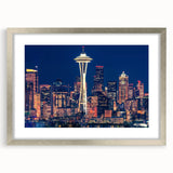 Textured abstract art print of Seattle skyline in muted gray and blue tones, framed in silver, ideal for bedroom art.