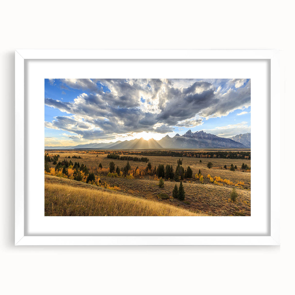 Abstract art print of Wyoming's Grand Tetons in muted earth tones on a framed white mat.