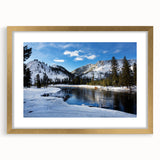 Extra large abstract art print of Yellowstone scenery in textured strokes, with muted earth tones on a gold-framed canvas.