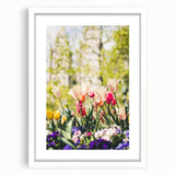 Abstract art print featuring swirling green and yellow colors on a white framed canvas, ideal for dining room decor.