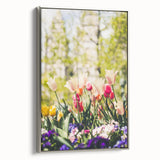 Framed canvas featuring a vintage landscape art painting of spring with colorful trees and a black background.