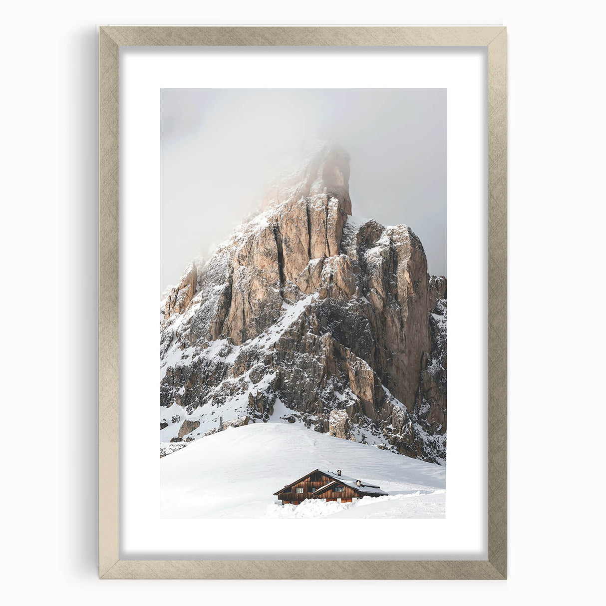 Textured abstract art print depicting a winter scene in muted blue and white tones, framed in silver, ideal for bedroom art.