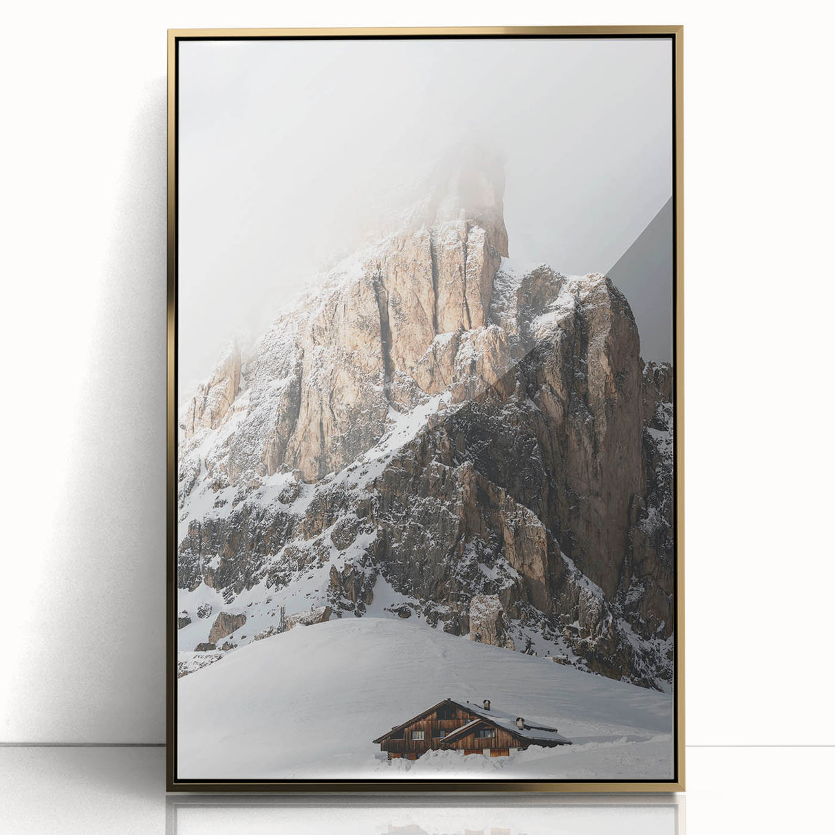 Mid-century modernist winter scene in muted blue and white hues, acrylic print in gold frame.