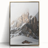 Mid-century modernist winter scene in muted blue and white hues, acrylic print in gold frame.