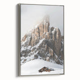 Framed canvas featuring a vintage winter landscape painting with muted blue and white tones, ideal for living room decor.